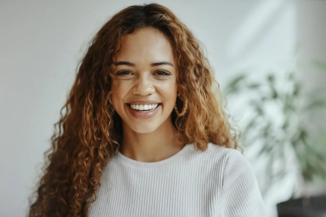 A woman smiling